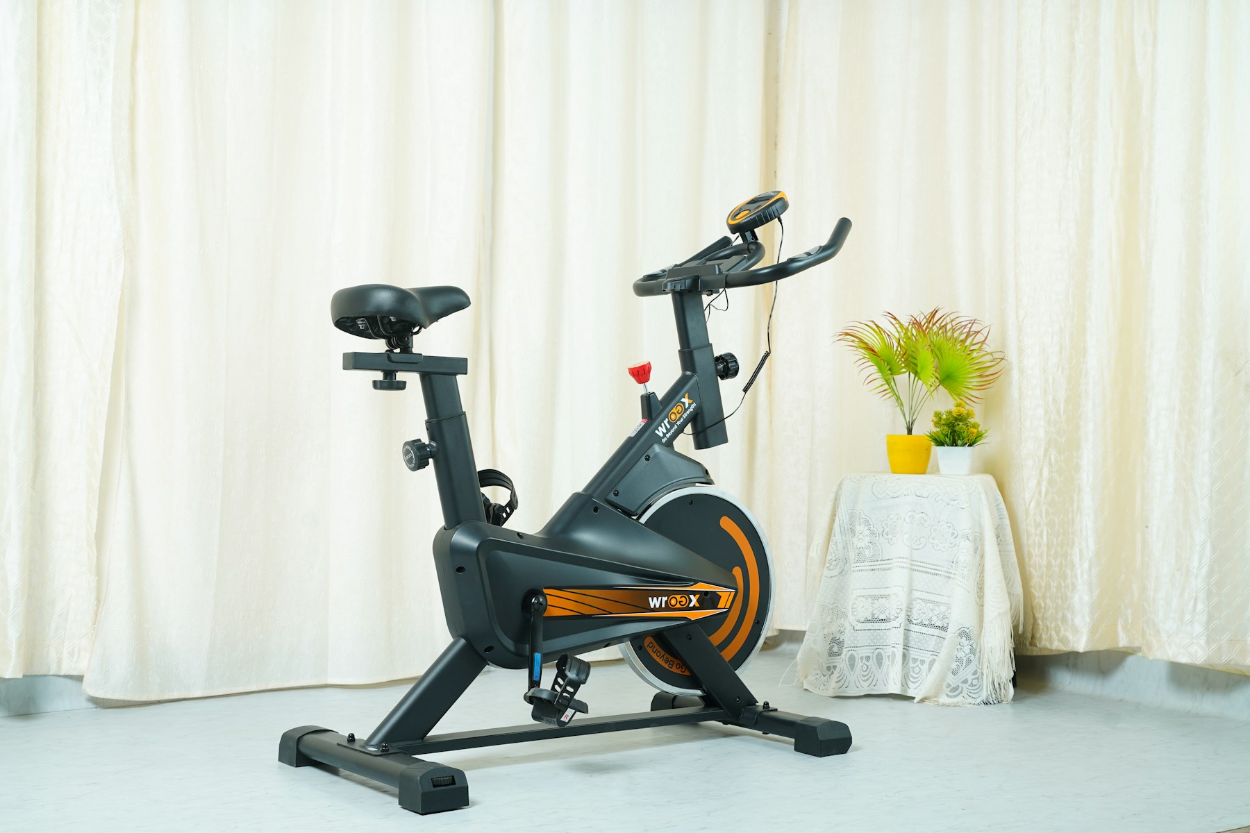 A stationary exercise bike in a home workout space